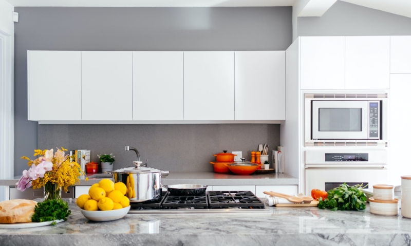 Gray Accent Wall Kitchen Ideas with Handleless White Cabinetry