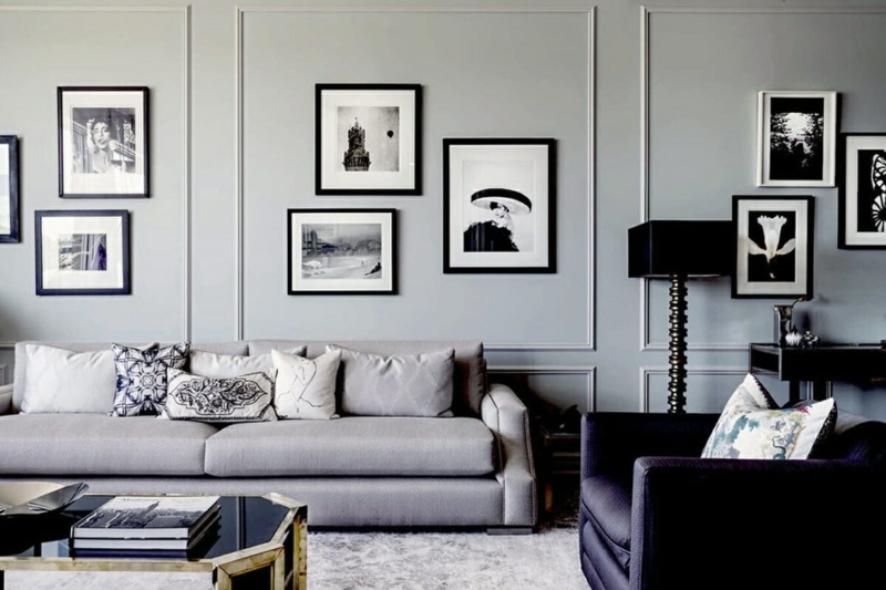 Gray Living Room Gallery Wall With Sophisticated Monochromatic Decor And Molding