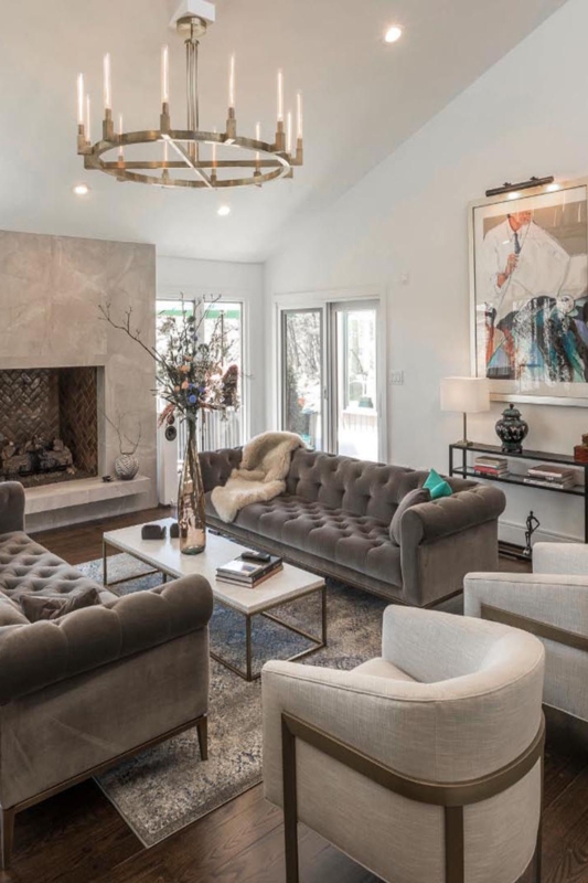 Grey Tufted Sofa Ideas with Large Wagon Wheel Candle Chandelier