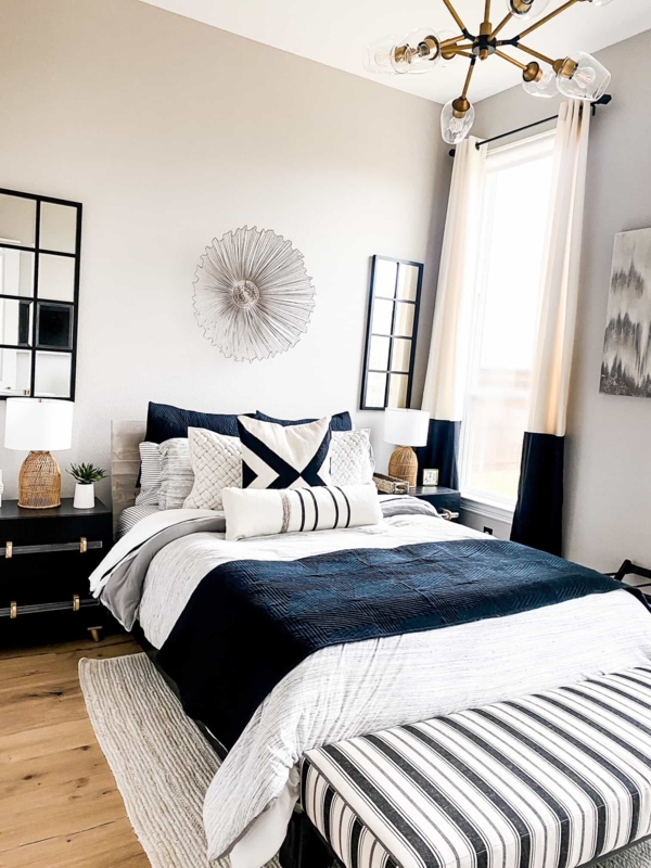 Guest Bedroom Featuring Grid Mirrors and Symmetrical Layout