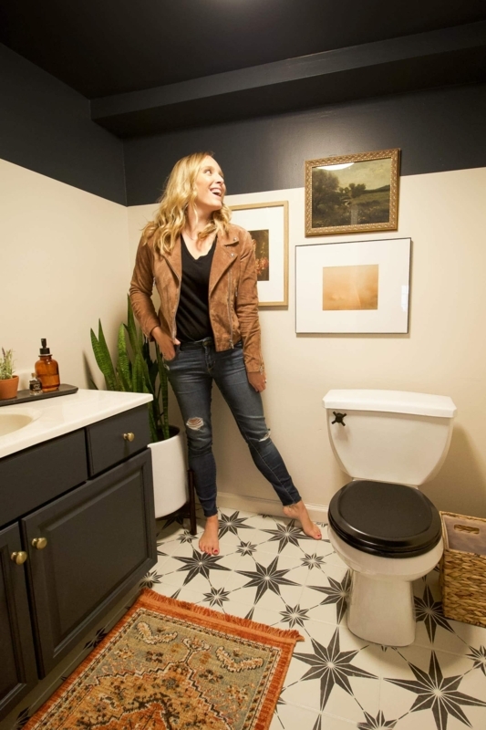 Half Bath with Bold Black Ceiling Design and Star Patterned Floor Tile