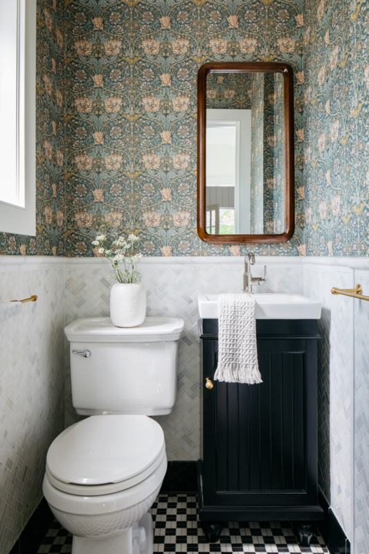 Half Bath with Marble Herringbone Wainscoting and Floral Wallpaper
