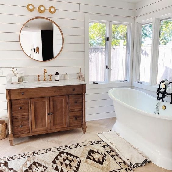 Herringbone Floor Bathroom in Modern Farmhouse Style with Gold Mirror