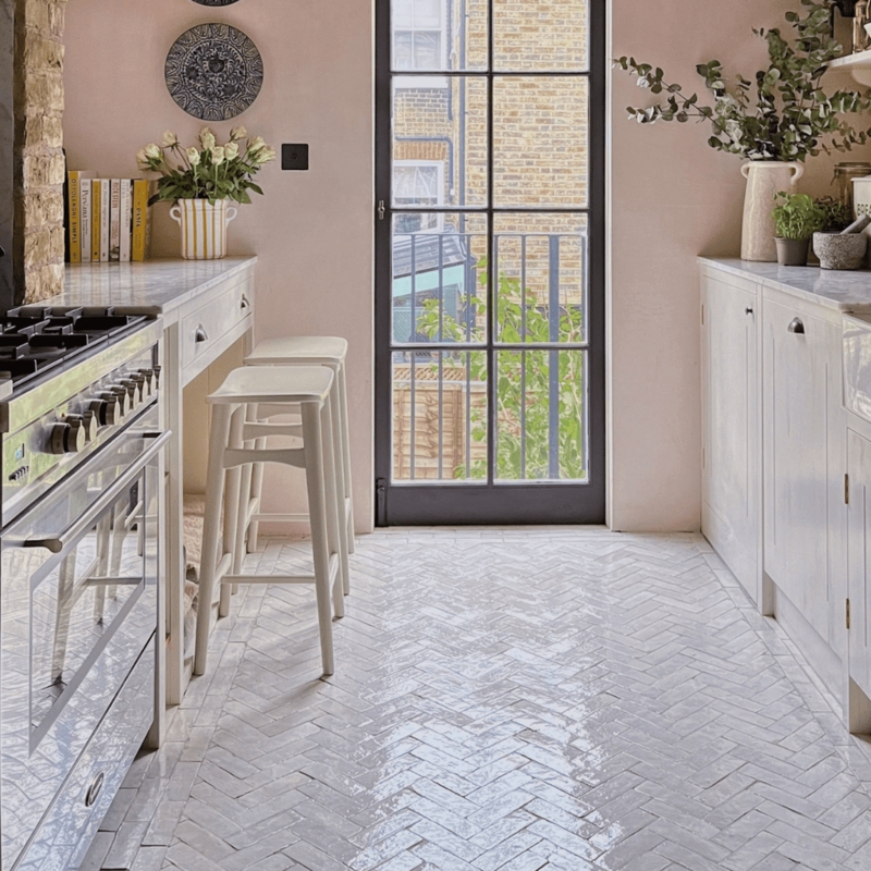Herringbone Kitchen Floor Tile Ideas with Blush Pink Walls
