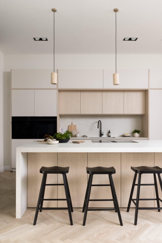 Herringbone Wood Kitchen Flooring featuring Black Bar Stools