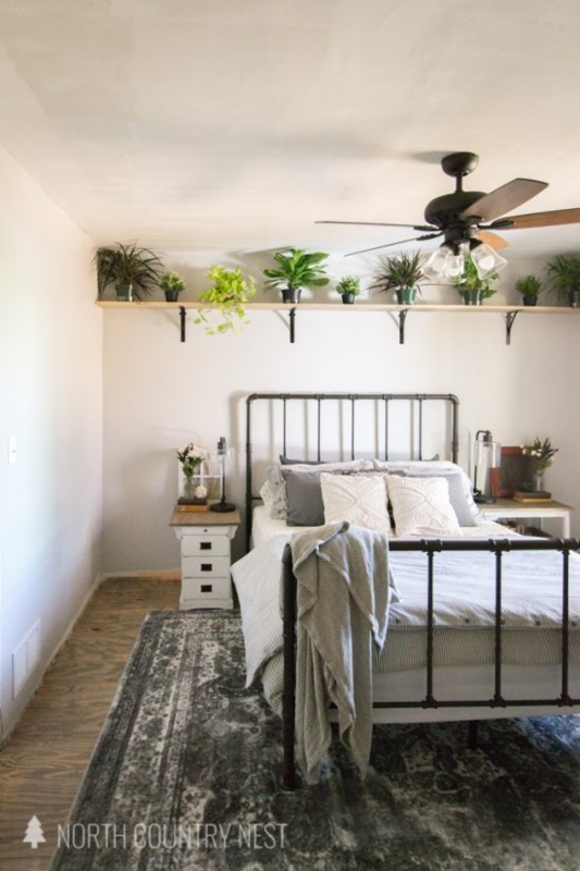 High-Mounted Wall Shelf for Plants above Industrial Pipe Bed Frame