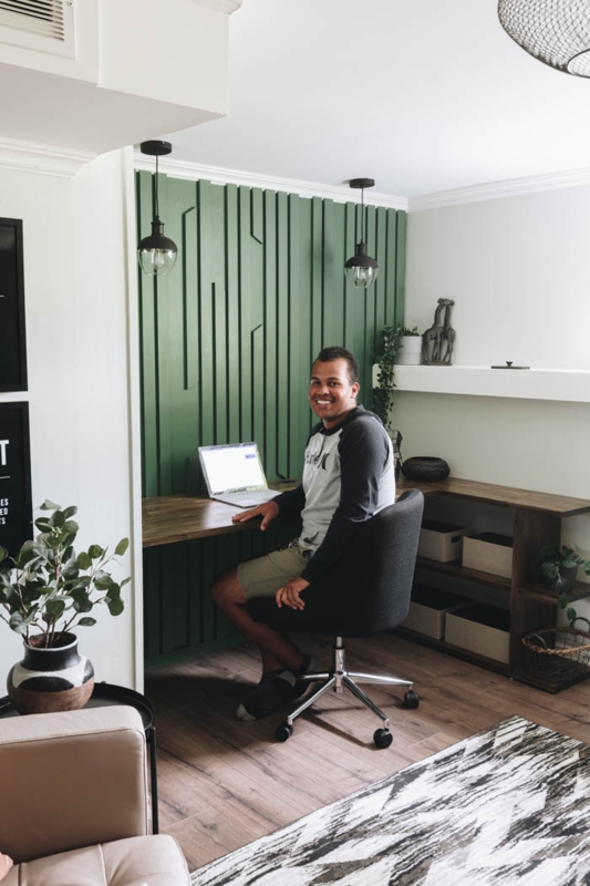 Home Office Setup featuring Forest Green Slat Accent Wall and Wood Desk