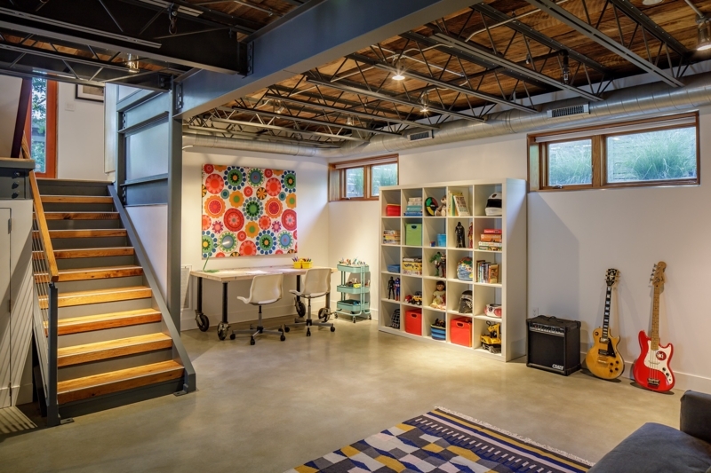 Home Office with Exposed Ceiling Trusses and Polished Concrete Floor