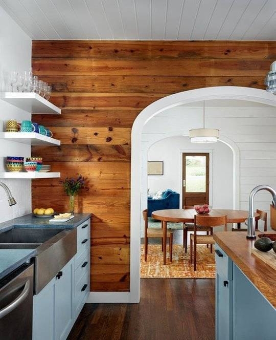 Horizontal Wood Plank Accent Wall by Arched Kitchen Doorway
