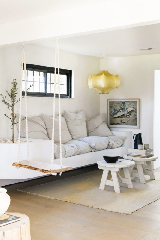 Indoor Wooden Swing Seat in a Minimalist Boho Living Room