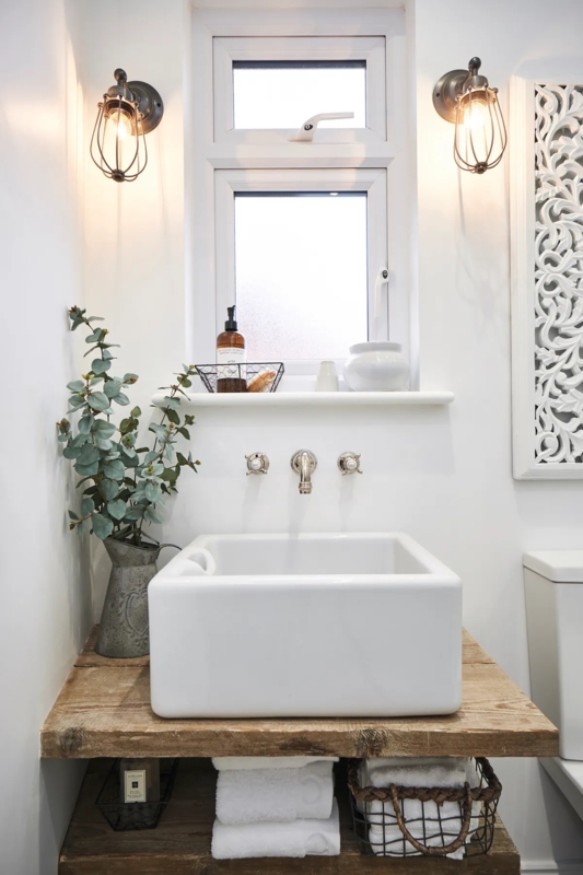 Industrial Chic Vanity with Vessel Sink and Cage Sconces