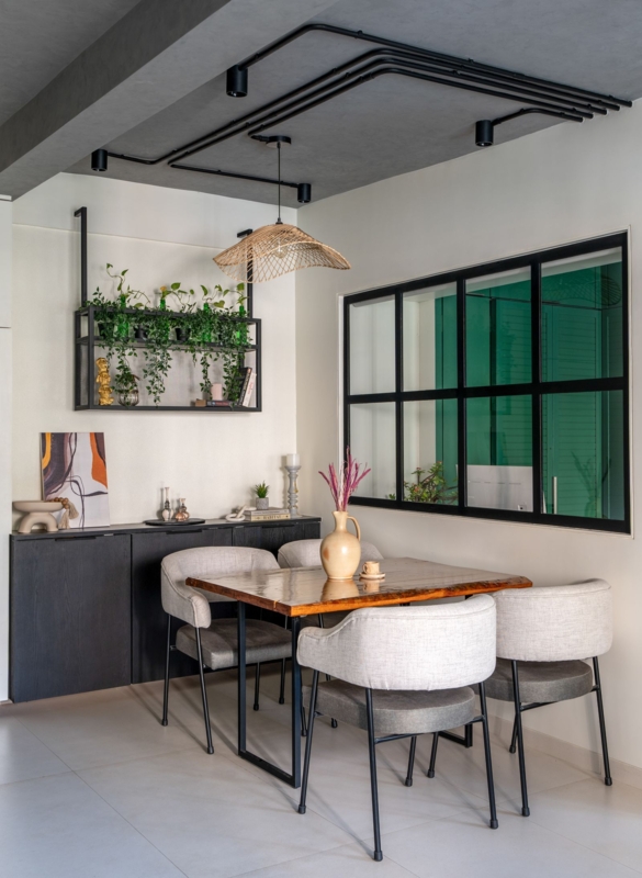 Industrial Dining Nook: Exposed Conduit Ceiling & Internal Grid Window