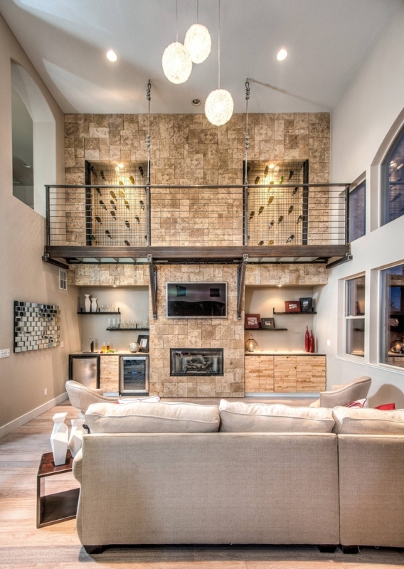 Industrial Great Room: Mezzanine Bridge and Tiled Stone Accent Wall