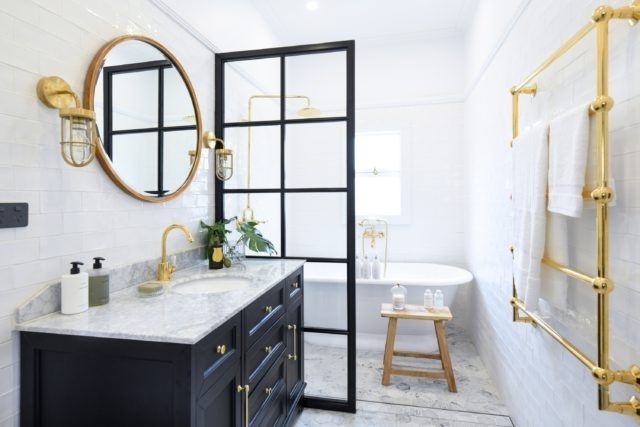 Industrial Grid Glass Partition in Bathroom with White Subway Tile