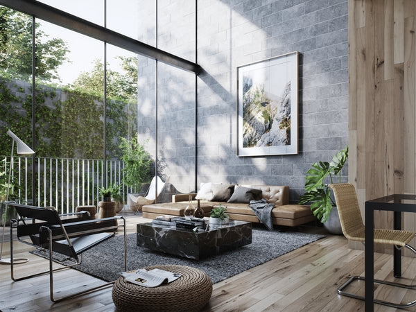 Industrial Living Room featuring Camel Leather Sectional and Brick Wall