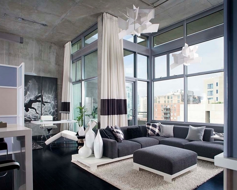 Industrial Loft Living Room with Concrete Ceiling and Geometric Pendants