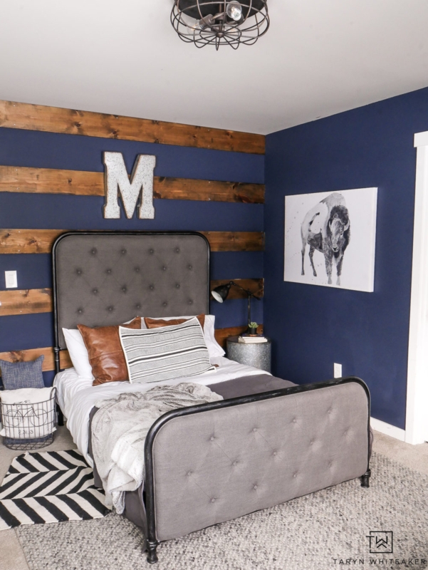 Industrial Rustic Upholstered Bed against Horizontal Wood Planks