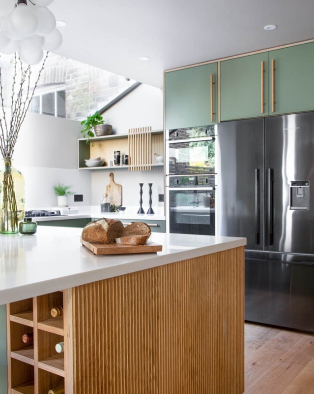 Integrated Wine Storage in Island with Sage Green Cabinets and Ribbing
