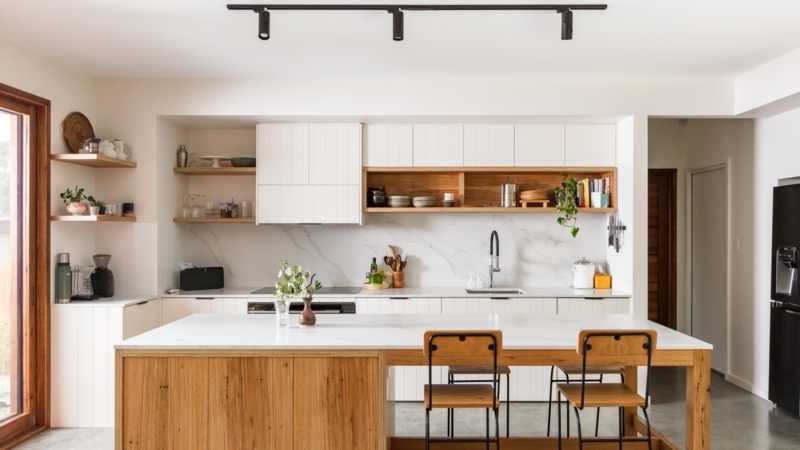 Japandi Kitchen with Wood Island and Marble Slab Backsplash