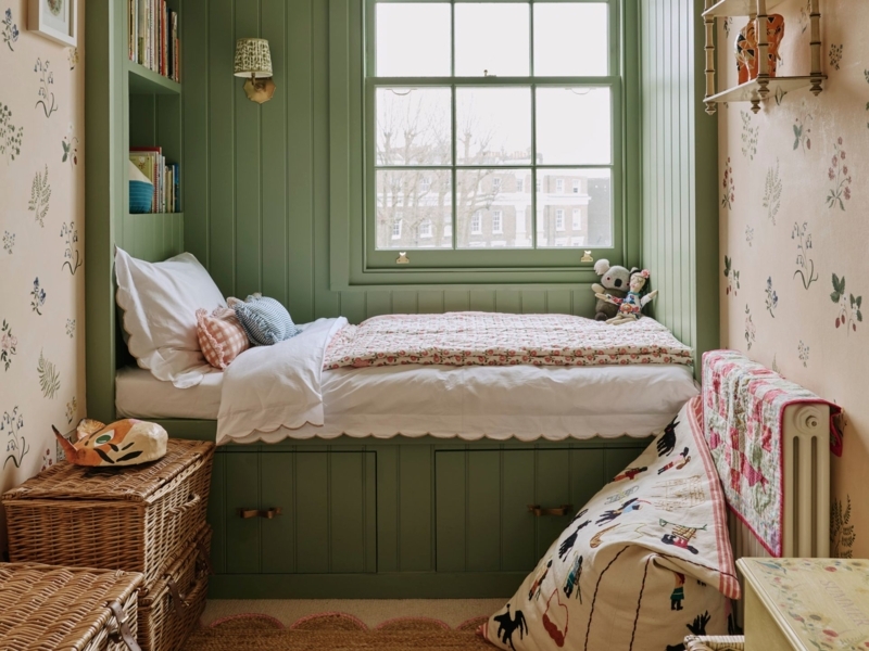 Kids Bedroom Nook with Sage Green Paneling and Built-in Window Seat