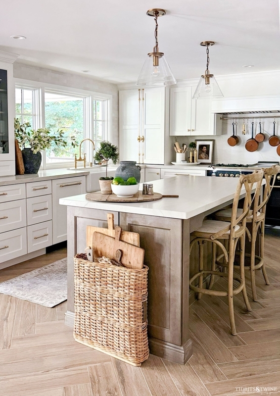 Kitchen Island in Taupe with Wicker Storage and Herringbone Floor