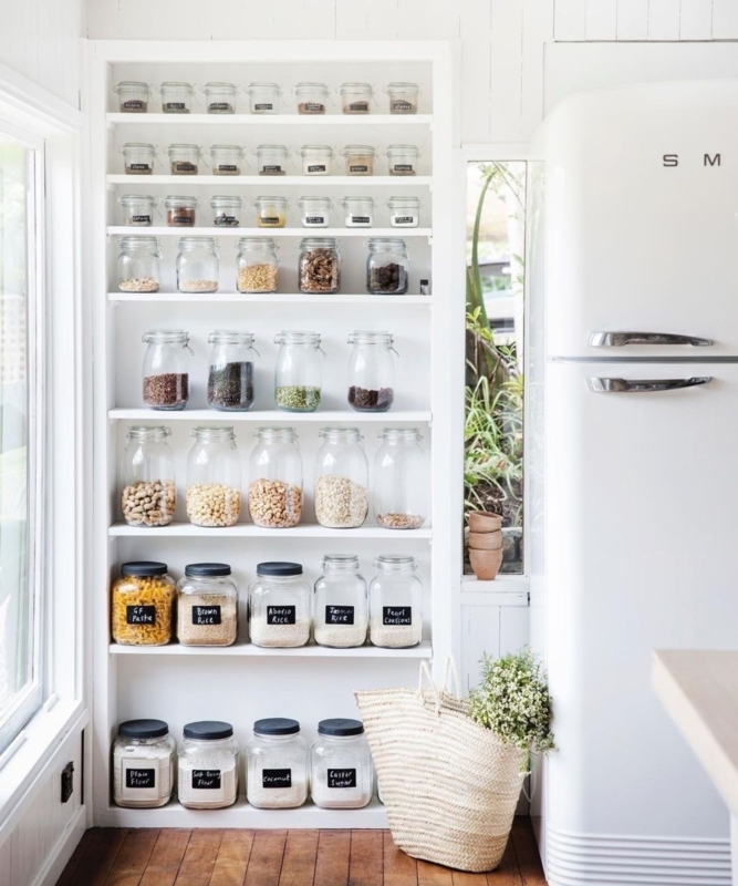 Kitchen Pantry with Recessed Shelving and Chalkboard Labels on Jars