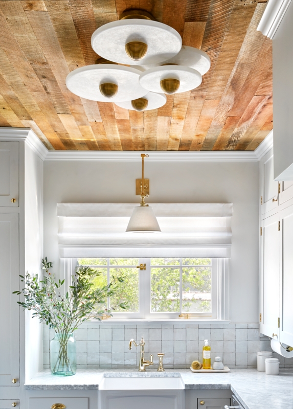 Kitchen with Reclaimed Wood Ceiling and Brass Bridge Faucet