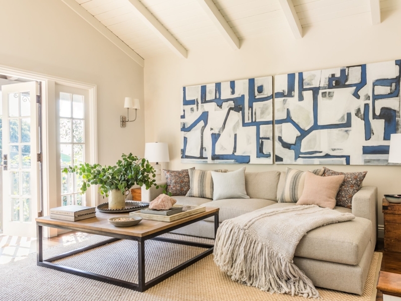 L-Shaped Sectional with Oversized Abstract Art in Beige Living Room