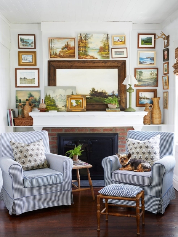 Landscape Painting Gallery Wall Above Brick Fireplace With White Mantel