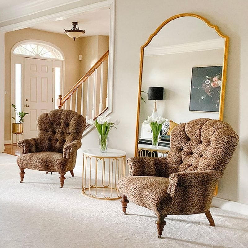 Leopard Print Accent Chairs with Arched Gold Mirror in Entryway