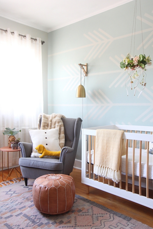 Light Blue Arrow Wallpaper Nursery with Gray Wingback Glider
