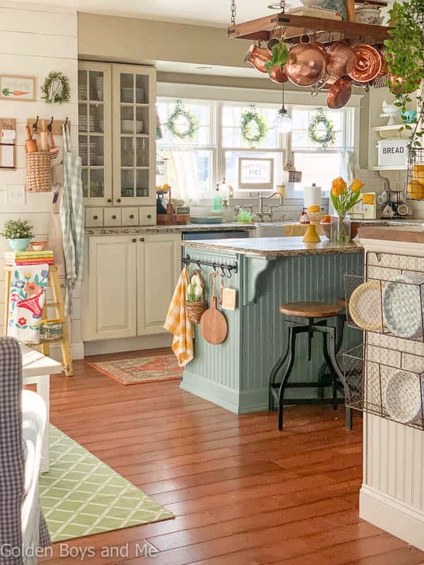 Light Blue Beadboard Kitchen Island With Hanging Copper Pot Rack