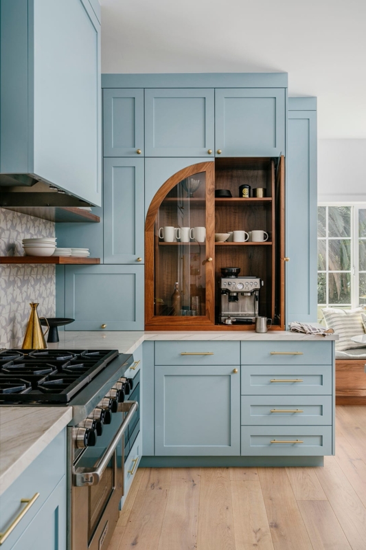 Light Blue Shaker Kitchen Cabinets with Arched Wood Coffee Station.