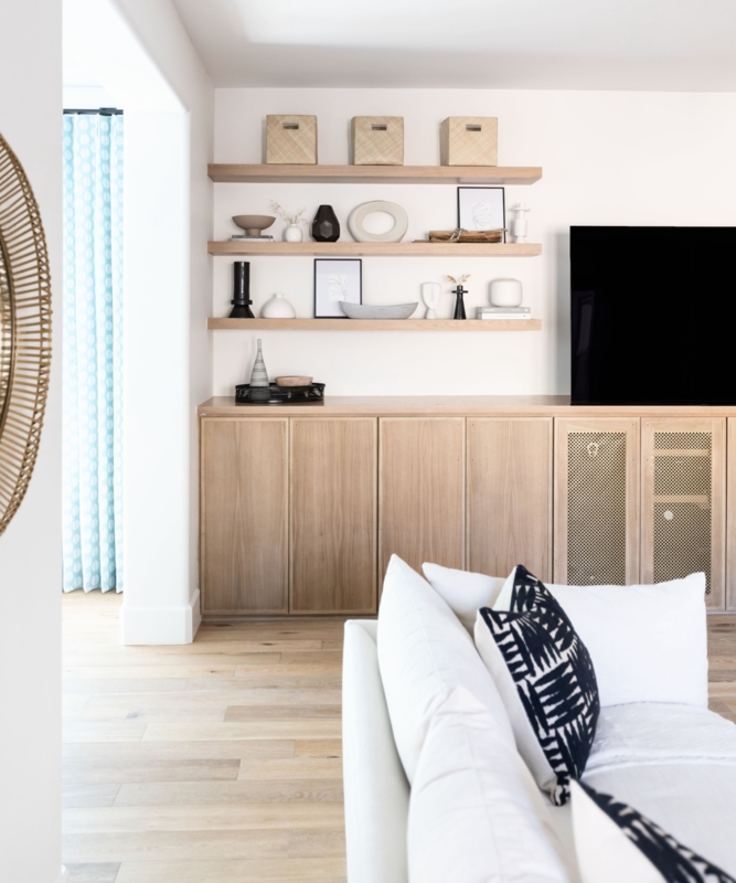 Light Wood Built-In Cabinetry with Floating Shelves and Mesh Panels