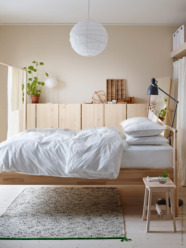 Light Wood Platform Bed Styling with Oversized Paper Lantern