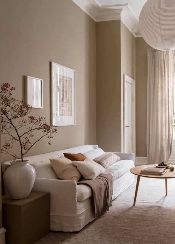 Linen Slipcovered Sofa and Paper Lantern Pendant in Beige Room