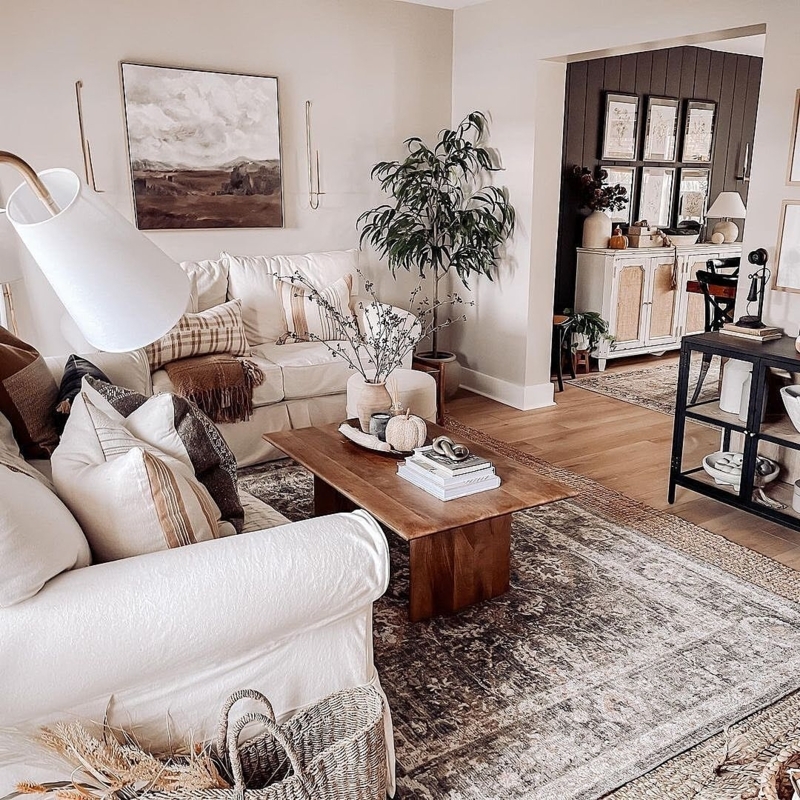 Living Room Cozy Earthy Slipcovered Sofa Distressed Area Rug