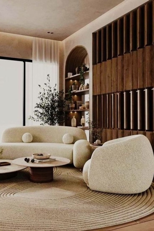 Living Room: Curved Boucle Sofa Styling and Textured Spiral Area Rug.