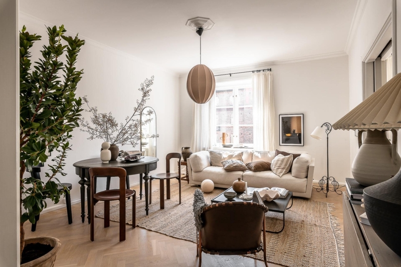 Living Room Herringbone Flooring with Pleated Fabric Pendant