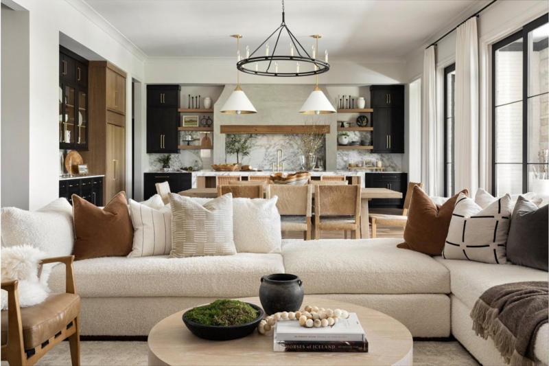 Living Room with Boucle Upholstery & Black Kitchen Cabinets
