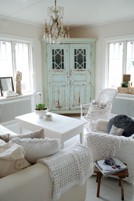 Living Room with Distressed Mint Finish Corner Cabinet & White Palette