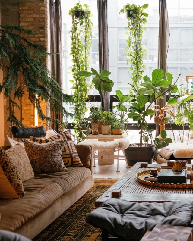 Living Room with Exposed Brick Wall and Trailing Foliage