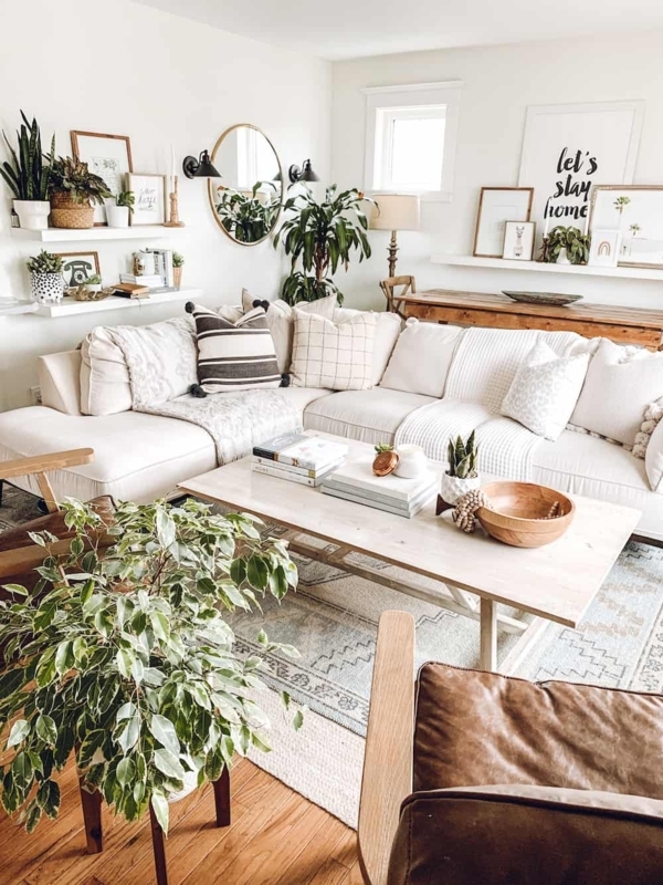 Living Room with Floating Wall Decor & Layered Rug Layout