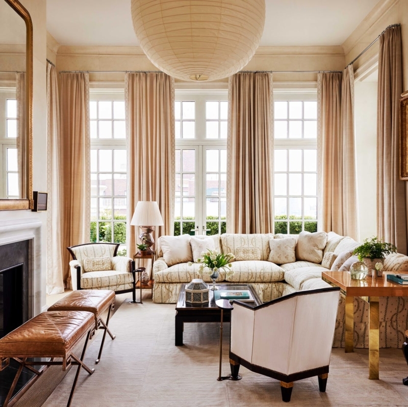 Living Room with Large Paper Lantern and Geometric Sectional Sofa Layout
