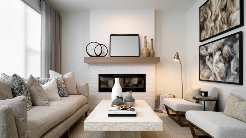 Living Room with White Brick Fireplace & Stone-Like Coffee Table