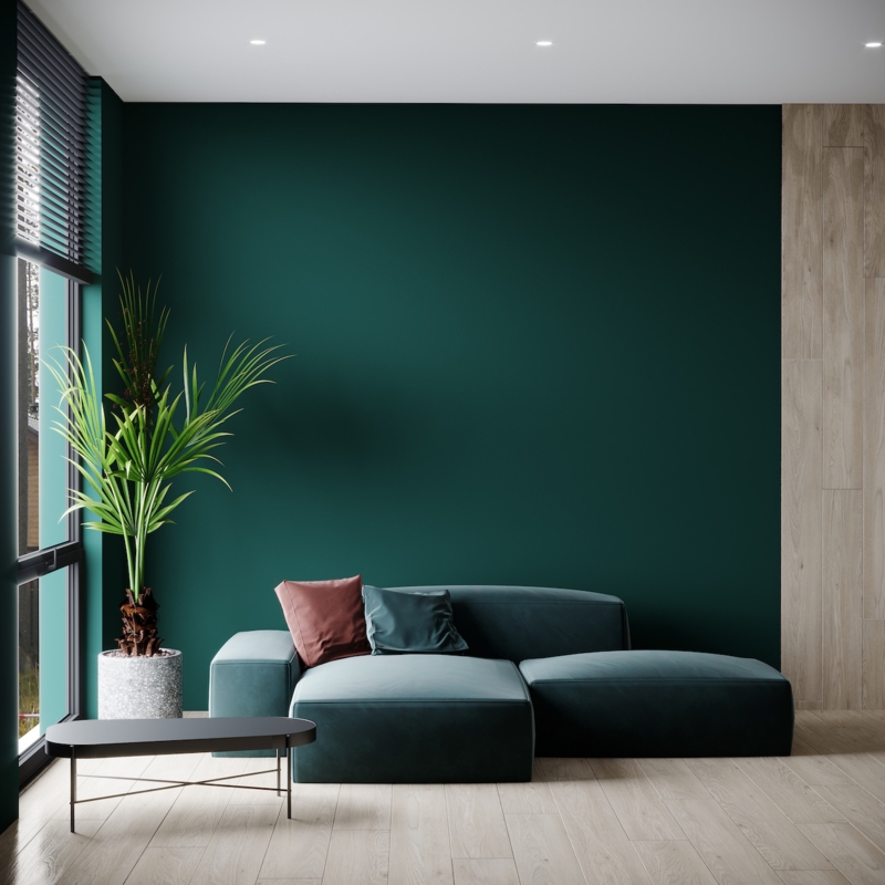 Low Profile Teal Sectional Sofa in Dark Green Accent Wall Lounge
