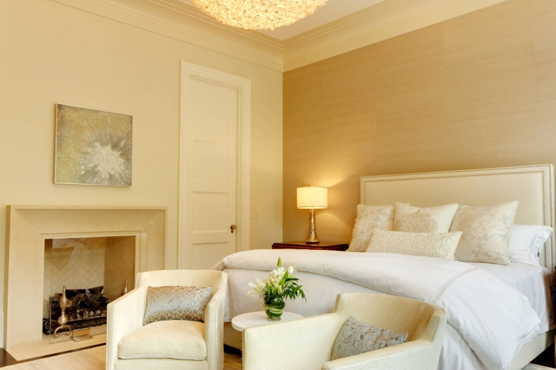Luxe Transitional Bedroom with Fireplace and Textured Grasscloth Wall