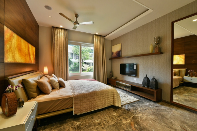 Luxurious Wood Paneled Wall with Backlit Panel and Marble Flooring