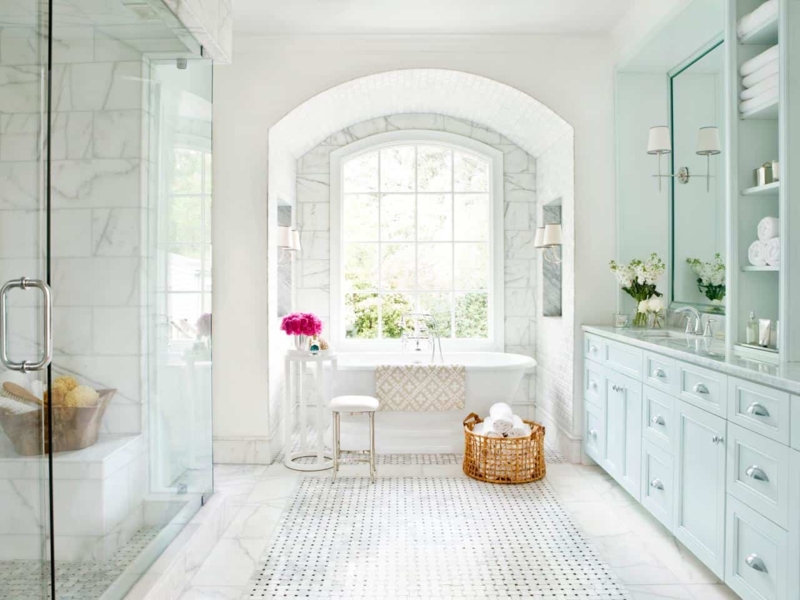 Luxury Bathroom Arched Window Niche, Mosaic Floor Rug. Freestanding Tub.