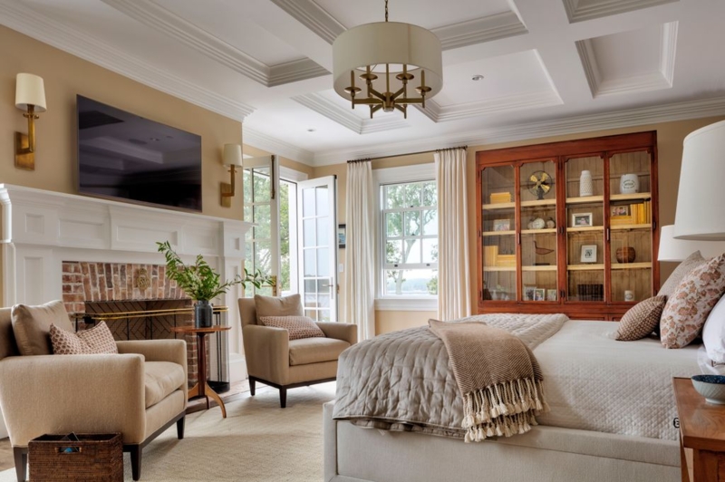 Luxury Guest Bedroom with Coffered Ceiling and Fireplace TV